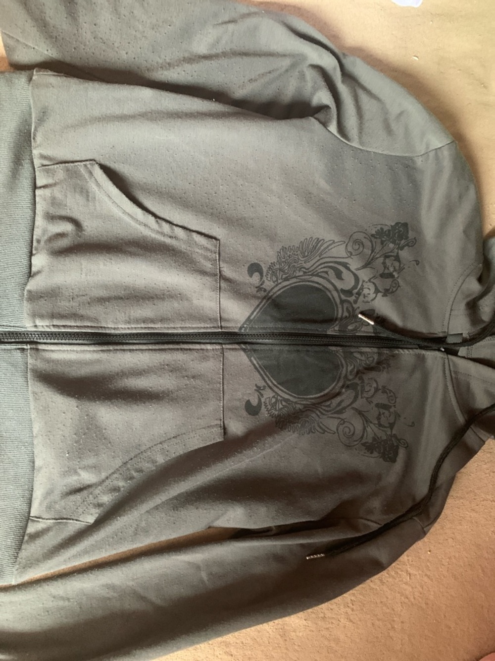Black Graphic Zip-Up Hoodie with Ornate Chest Design